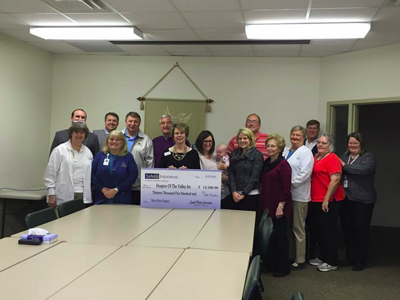 stovall-marks-insurance-team-with-charity-check