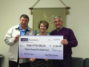 stovall-marks-with-check-for-hospice-of-the-valley